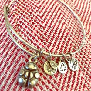 Alex and Ani Lady Bug bracelet in silver tone.